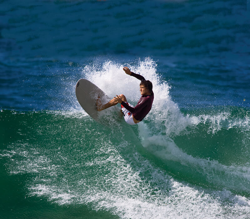 Blake Oakfield surfing