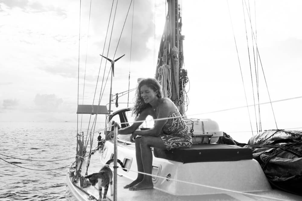 Liz Clark on boat with cat