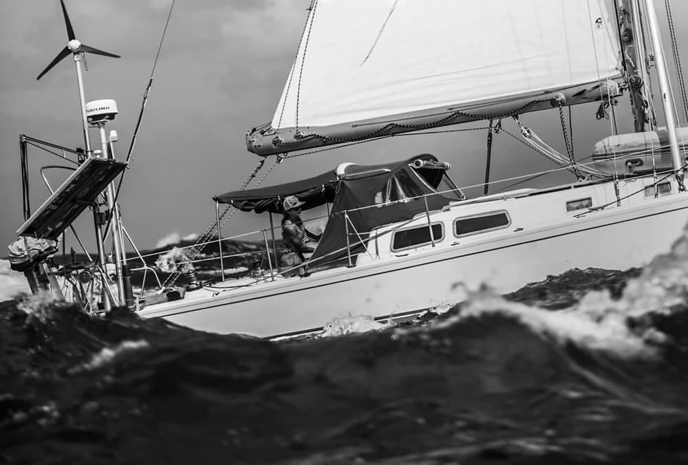 Liz Clark sailing in rough waves