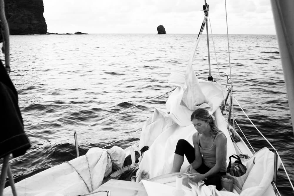 Liz Clark sitting on her boat