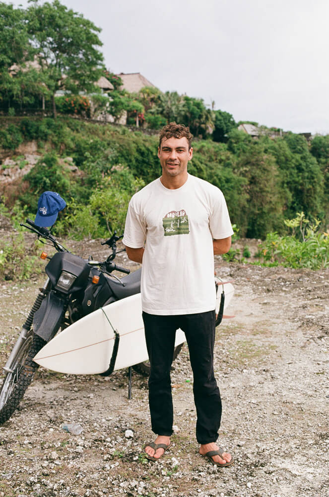 Tom de souza and his motorbike with surf rack